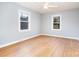 Bright bedroom with hardwood floors and neutral-colored walls at 229 Claudette Dr, Gastonia, NC 28052