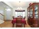 Dining room with bay window, chandelier, hardwood floors, and wooden dining table set at 255 Horizon Cir, Rock Hill, SC 29732