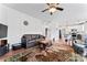 Open living room with a view into the kitchen at 9154 Snow Hill Ct, Charlotte, NC 28269