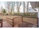 Backyard with a wooden deck, ramp, and wooden privacy fence at 121 Pam Dr, Gastonia, NC 28056