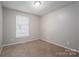 Empty bedroom with neutral walls and carpeted floors at 121 Pam Dr, Gastonia, NC 28056