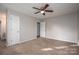 Main bedroom with ensuite bathroom and carpeted floors at 121 Pam Dr, Gastonia, NC 28056