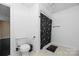 Basement bathroom with shower and toilet at 1350 Kensington Cir, Newton, NC 28658