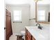 Clean bathroom with single vanity and shower/tub combo at 1350 Kensington Cir, Newton, NC 28658