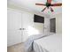 Bedroom with a flat-screen TV and double doors at 1350 Kensington Cir, Newton, NC 28658