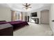 Primary bedroom with large TV and plenty of space at 1350 Kensington Cir, Newton, NC 28658