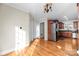 Hardwood floor dining area, view into kitchen and living room at 1350 Kensington Cir, Newton, NC 28658