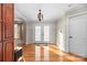 Bright dining area with hardwood floors and French doors at 1350 Kensington Cir, Newton, NC 28658