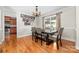 Bright dining room with hardwood floors and view into kitchen at 1350 Kensington Cir, Newton, NC 28658