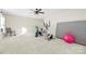 Basement exercise room with various workout equipment at 1350 Kensington Cir, Newton, NC 28658