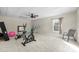 Basement exercise room with various workout equipment at 1350 Kensington Cir, Newton, NC 28658