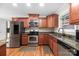Kitchen with stainless steel appliances and wood cabinets at 1350 Kensington Cir, Newton, NC 28658