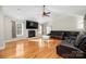 Spacious living room with hardwood floors, fireplace, and vaulted ceiling at 1350 Kensington Cir, Newton, NC 28658