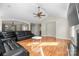 Spacious living room with hardwood floors, fireplace, and vaulted ceiling at 1350 Kensington Cir, Newton, NC 28658