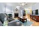 Living room with hardwood floors, fireplace, and comfortable seating at 13521 Toka Ct, Huntersville, NC 28078