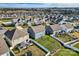 Aerial photograph showing houses with backyard at 137 Yellow Birch Loop, Mooresville, NC 28117