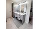 Spacious bathroom featuring a double vanity, large mirrors, and modern lighting at 2791 Round Hill Rd, Rock Hill, SC 29730