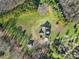 Aerial view of house, detached garage and expansive lot at 29162 Pennington Rd, Albemarle, NC 28001