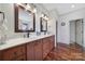 Elegant bathroom with double vanity, marble countertops, and ample storage at 29162 Pennington Rd, Albemarle, NC 28001