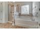 Bathroom with shower/tub combo and tile flooring at 3028 Semmes Ln, Indian Trail, NC 28079