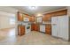 Bright kitchen with wood cabinets and granite countertops at 4620 Sharon View Rd, Charlotte, NC 28226