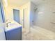Modern bathroom with gray tile shower and bathtub at 1254 Huckleberry Dr, Lincolnton, NC 28092