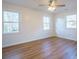 Bright bedroom with wood floors and multiple windows at 1254 Huckleberry Dr, Lincolnton, NC 28092
