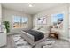 Bright and airy bedroom with large windows and stylish decor at 128 Balboa St # 25, Matthews, NC 28104