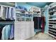 Organized walk-in closet with built-in shelving, drawers, and plenty of hanging space at 15193 Legend Oaks Ct, Fort Mill, SC 29707