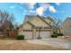 Two-story house with three-car garage and basketball hoop at 1938 Caprington Dr, Fort Mill, SC 29707