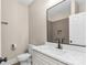 Bathroom with single vanity, toilet and shower at 2600 Main Ave Nw Dr, Hickory, NC 28601