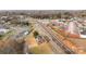 Bird's-eye view of a newly constructed residence surrounded by infrastructure and neighboring buildings at 402 N Battleground Ave, Kings Mountain, NC 28086