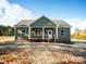 Charming green two-story home with a covered front porch and inviting curb appeal at 522 Waco Rd, Kings Mountain, NC 28086