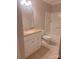 Bathroom with white vanity, toilet, and shower/tub combo at 8231 Southgate Commons Dr, Charlotte, NC 28277