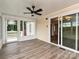 Bright sunroom with access to a back deck and views of the backyard at 973 Tot Dellinger Rd, Cherryville, NC 28021