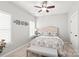 Charming bedroom with a queen-size bed and plantation shutters at 1209 Cedar Park Dr, Pineville, NC 28134