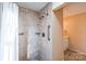 Large walk-in shower with tiled walls and grab bars at 1295 Reservation Rd, Rock Hill, SC 29730