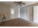 Well-lit bedroom with carpet flooring and double closets at 143 Glenwood Dr # C, Rock Hill, SC 29732