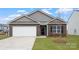 New construction home with brick and siding exterior, attached two-car garage, and front yard at 2620 Goose Fair Rd, Maiden, NC 28650