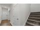 Carpeted stairway with hardwood floors in the entryway at 2626 Goose Fair Row, Maiden, NC 28650