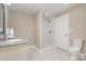 Clean bathroom with shower and granite vanity at 303 Villa St, Kannapolis, NC 28083