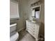 Bathroom with white vanity and decorative mirror at 5 Cauthen St, Rock Hill, SC 29730