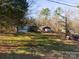 Aerial view of a manufactured home and red workshop at 5040 Spicewood Dr, York, SC 29745