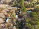 Aerial view showcasing home, several mobile homes, and surrounding woods at 5040 Spicewood Dr, York, SC 29745