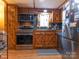 Rustic kitchen with wood cabinets and stainless steel appliances at 5040 Spicewood Dr, York, SC 29745