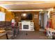 Living room features a brick accent wall, fireplace, and large TV at 5040 Spicewood Dr, York, SC 29745