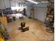 Spacious workshop with double doors, ample storage, and concrete floor at 5040 Spicewood Dr, York, SC 29745