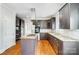 Spacious kitchen with stainless steel appliances, dark wood cabinets, and a granite island at 520 Beacon Knoll Ln, Fort Mill, SC 29708