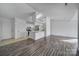 Kitchen with breakfast bar, white cabinets, and tile floor at 6270 Rosecroft Dr, Charlotte, NC 28215