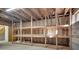 Unfinished basement with extensive shelving system at 7907 Royal Ct, Waxhaw, NC 28173